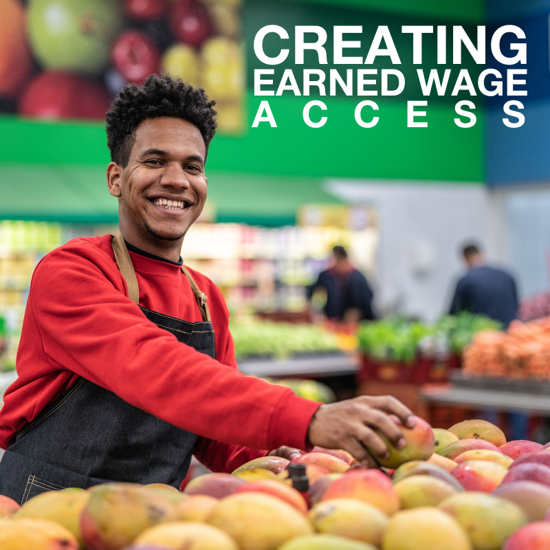 image of a worker in a grocery store in produce section smiling at viewer with text overlay "Creating Earned Wage Access"